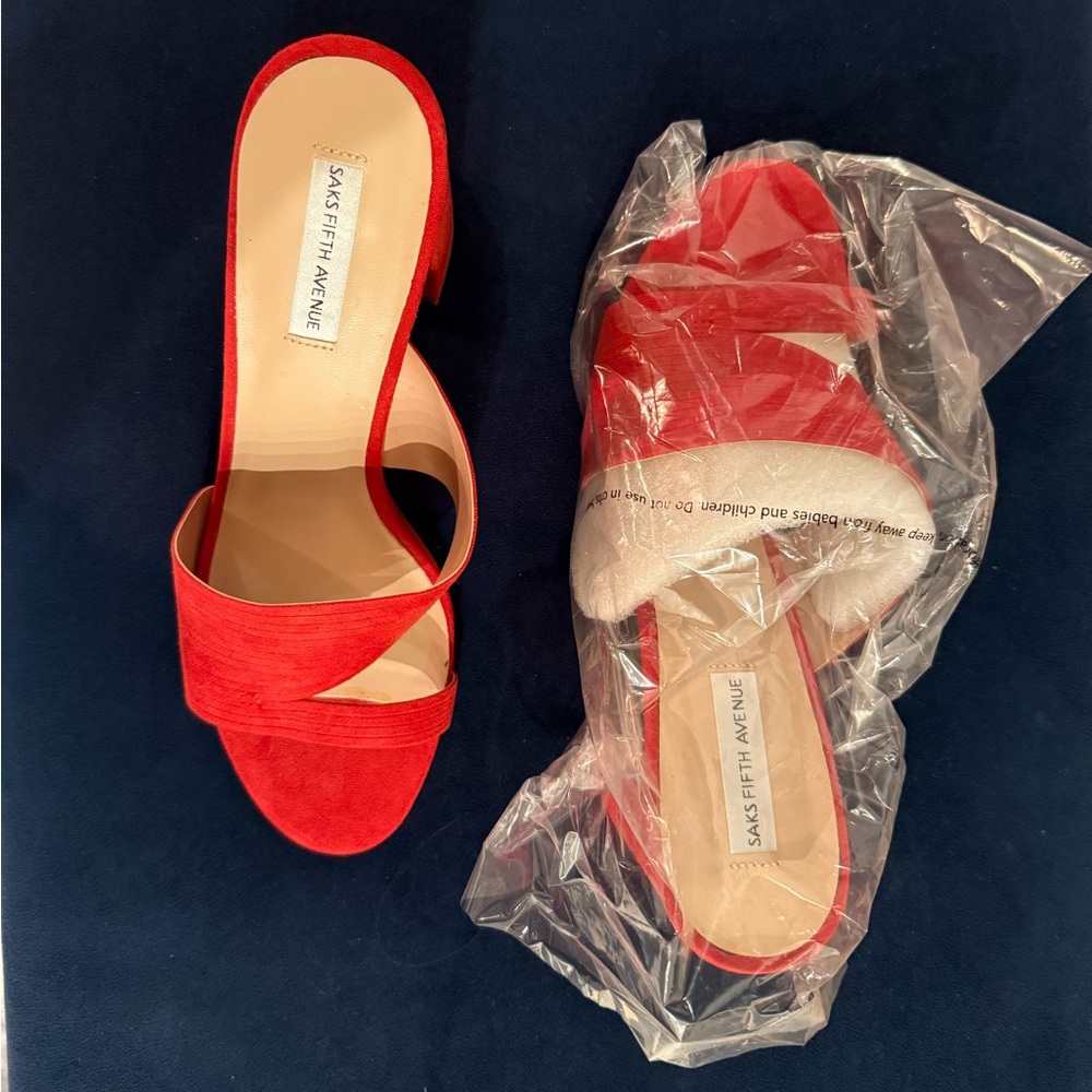 Brand new, never worn Saks Fifth Avenue red block, suede heels.